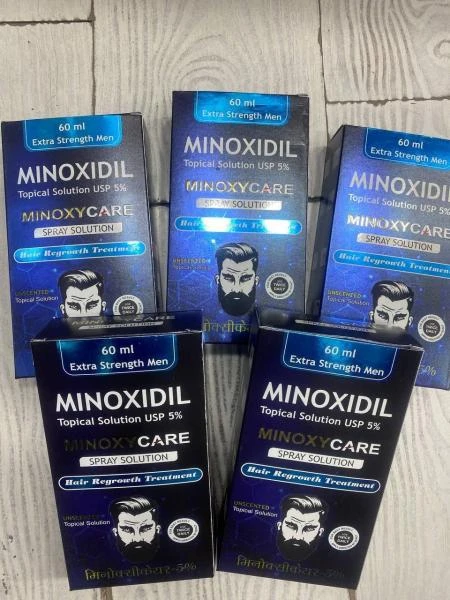 Minoxycare 5 % sprey dlya volos